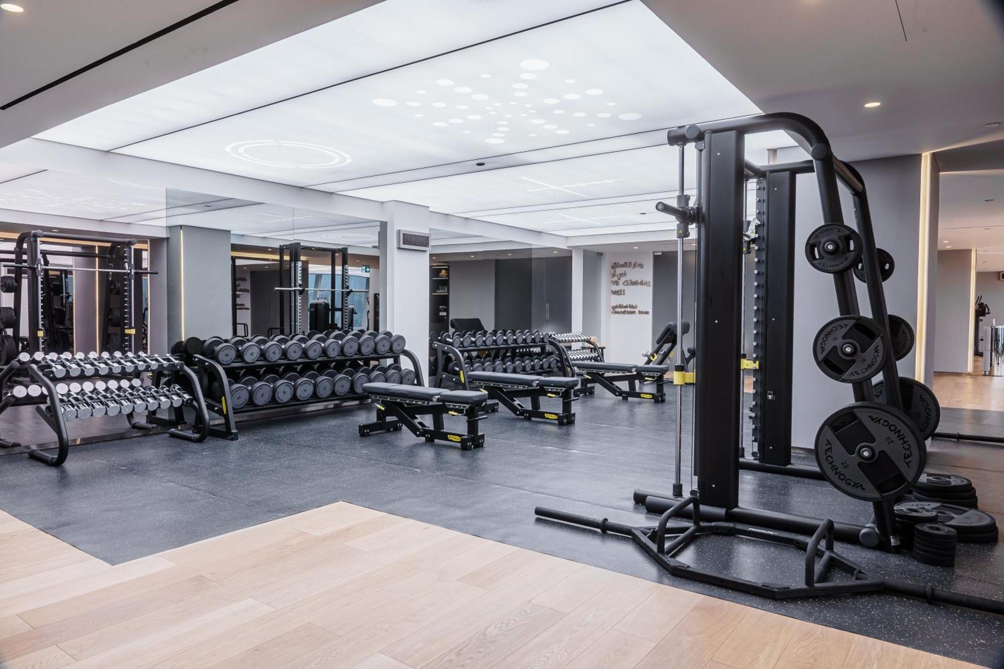 Fairmont Doha Hotel Lusail Exterior photo The gym at The Ivy Collection