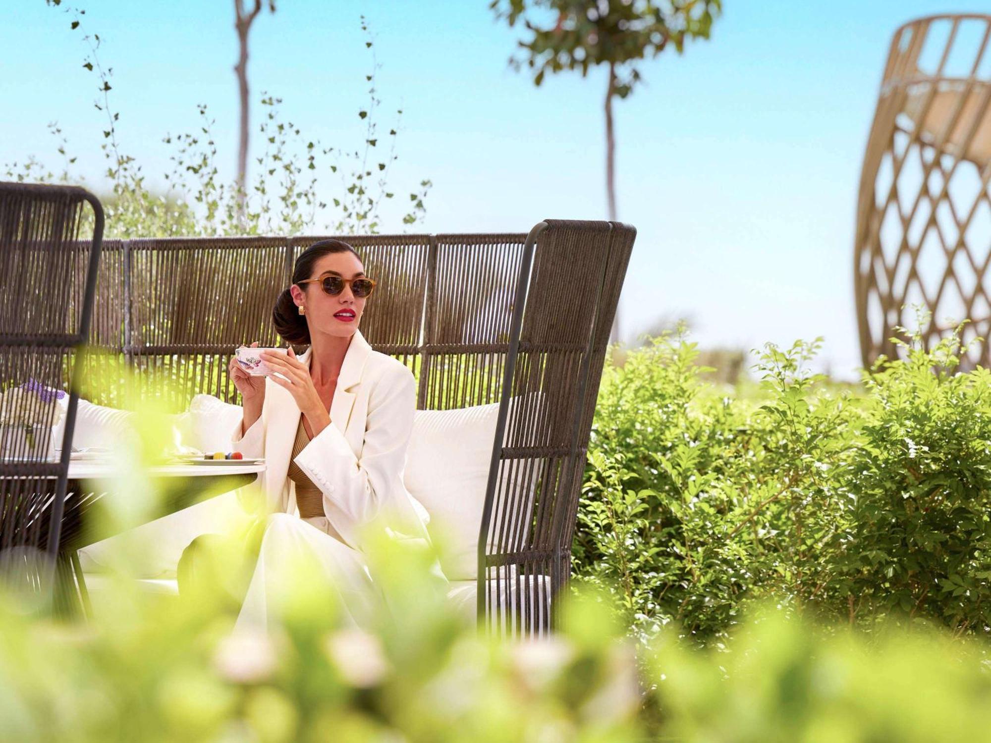 Fairmont Doha Hotel Lusail Exterior photo The resort's gardens